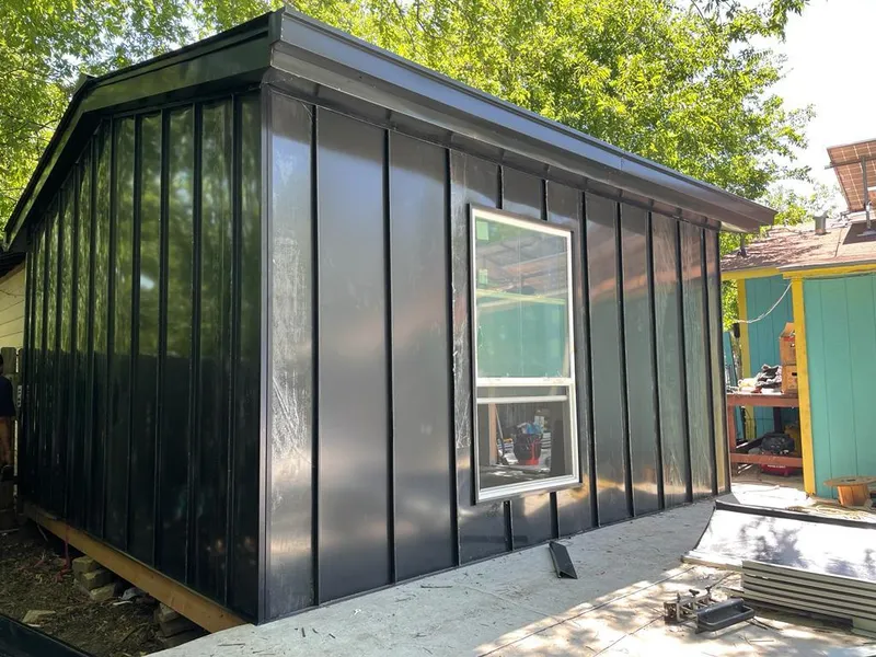 Black standing seam metal wall panels for Roof Inspection in El Cajon