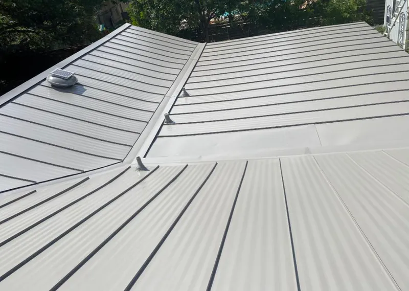 Solar attic fan installed on a metal roof for Roof Ventilation in El Cajon